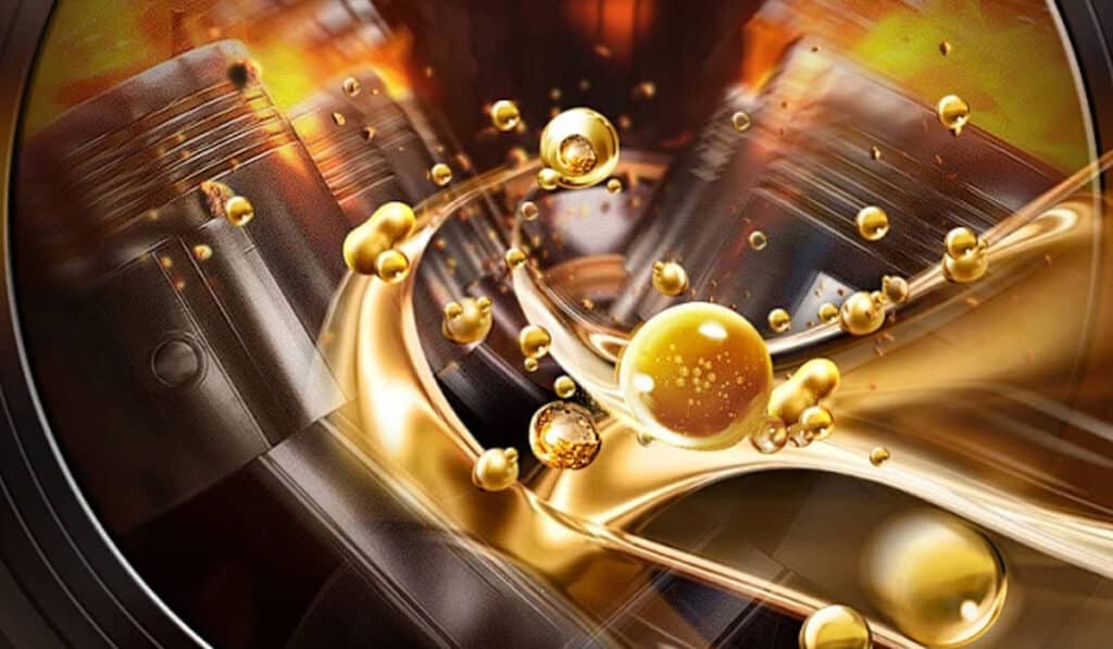 Golden lubricant droplets flowing around engine cylinders in a high‑temperature combustion environment, representing 2026 trends in synthetic lubricants with superior oxidation stability, longer drain intervals and Industry 4.0 precision manufacturing