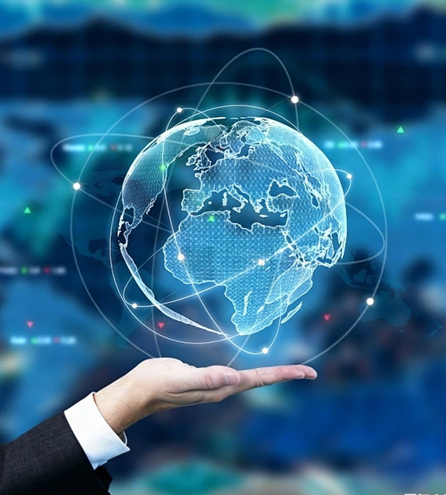 Hand holding a digital globe with glowing network lines and growth arrows, symbolizing global trends in lubricant manufacturing for 2026 including sustainability, bio‑based oils, smart factories and EV fluids expansion in Asia‑Pacific, Europe and emerging markets