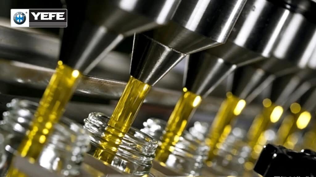 YEFE hydraulic oil manufacturer automated filling line showing precision bottling process with golden hydraulic fluid, demonstrating the quality control advantages of working directly with a hydraulic oil manufacturer including ISO certified production, batch consistency, controlled blending processes, and direct oversight of formulation compared to traders who cannot control product quality or provide custom formulations