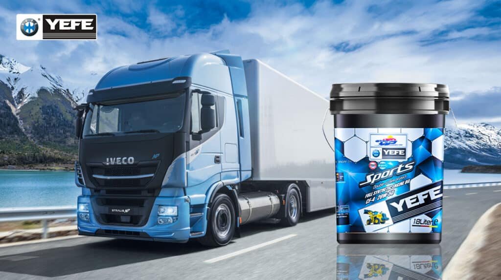 Blue IVECO Stralis NP heavy-duty truck in motion on a scenic highway, paired with a 18-liter pail of YEFE Sports full synthetic diesel engine oil (CF-4 20W-50), demonstrating how advanced lubrication technology supports fuel efficiency and engine durability under real-world transport conditions, especially in long-haul and high-load applications.