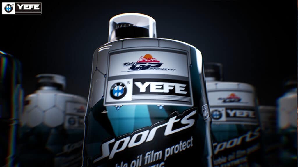 A close-up of a sleek YEFE Sports engine oil bottle under dramatic studio lighting, showcasing its premium branding with “MotoGP Rookies Cup” endorsement and BMW-style logo — symbolizing high-performance formulation derived from motorsport technology, now adapted to deliver superior oil film protection, thermal stability, and wear resistance in extreme-duty truck engines across Africa and the Middle East.