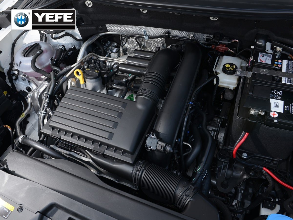 Close-up of a passenger car engine compartment representing engine oil lubrication, protection, and routine vehicle maintenance