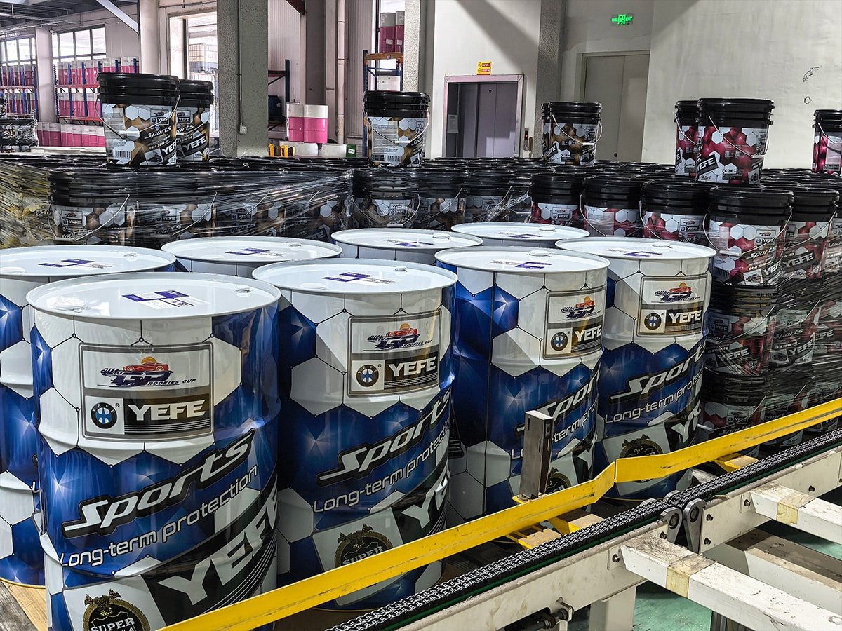 YEFE lubricant containers and pails on an automated production line for passenger vehicle engine oil and automotive lubricant supply